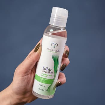 hand holding organic aloe vera lubricant